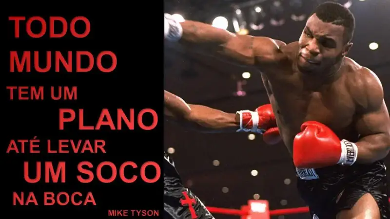 O desafio ao perfeccionista. Uma foto do Mike Tyson (pugilista) dando um soco e ao lado a frase: Todo mundo tem um plano até levar um soco na boca.
