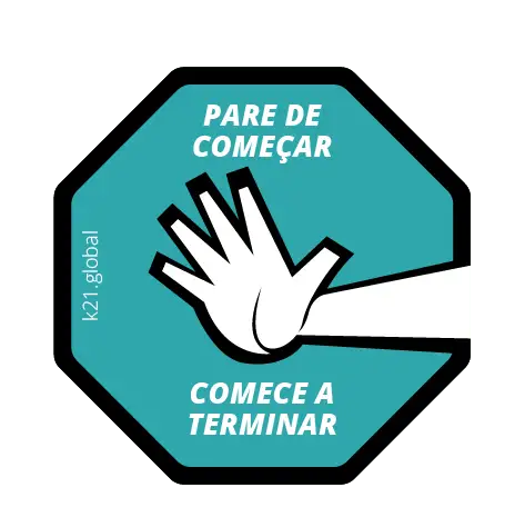 Ilustração em formato de octógono azul com uma mão branca aberta no centro, simbolizando um sinal de pare. No topo, está escrito 'PARE DE COMEÇAR' em branco, e na parte inferior, 'COMECE A TERMINAR'. À esquerda, há o texto 'k21.global' na vertical. A imagem transmite uma mensagem visual de foco em concluir tarefas antes de iniciar novas.